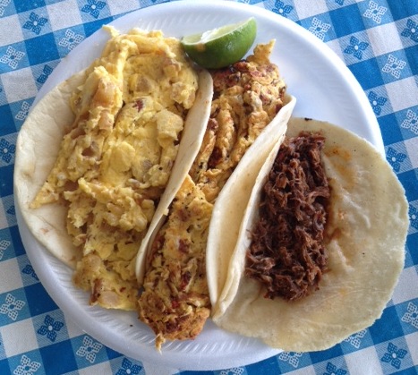 Potato & egg, bacon & egg and barbacoa de chive tacos at La Fruta Feliz.